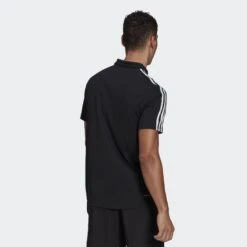 Adidas Polo-Shirt 1/2 Arm 10639896 10 Adidas Polo-Shirt 1/2 Arm 10639896 -Woehrl Populaire Boutique GM2075 APP on model back gradient
