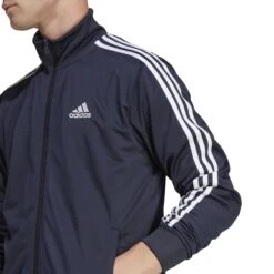 Adidas Sportswear Basic 3-Streifen Tricot Trainingsanzug 10680741 33 Adidas Sportswear Basic 3-Streifen Tricot Trainingsanzug 10680741 -Woehrl Populaire Boutique HZ2220 8 APPAREL On Model Detail View 1 transparent