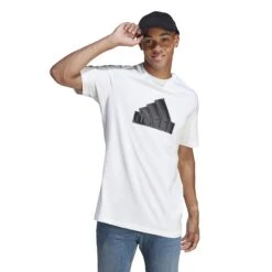 Adidas Future Icons Badge Of Sports T-Shirt 10680770 28 Adidas Future Icons Badge Of Sports T-Shirt 10680770 -Woehrl Populaire Boutique IC3710 3 APPAREL On Model Standard View transparent